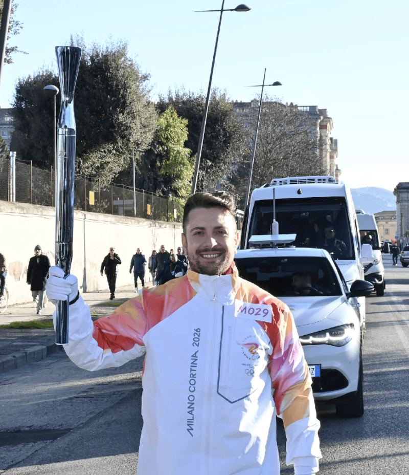 Carrying the Olympic torch for Milano Cortina 2026